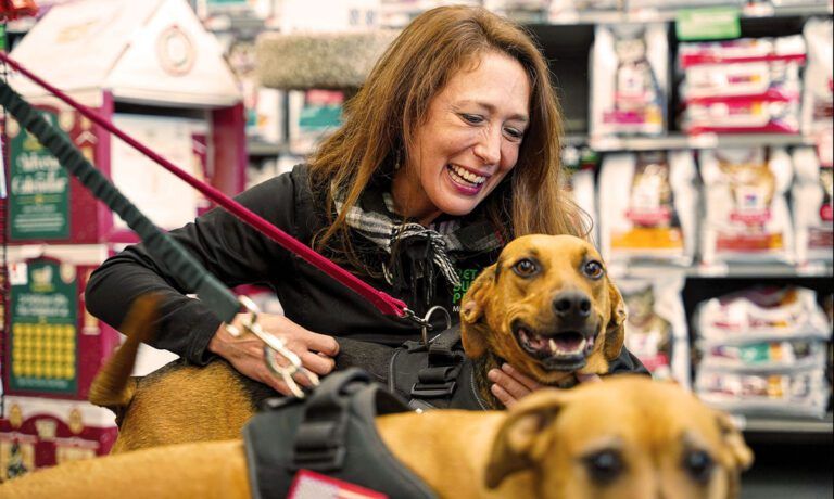 woman with 2 dogs